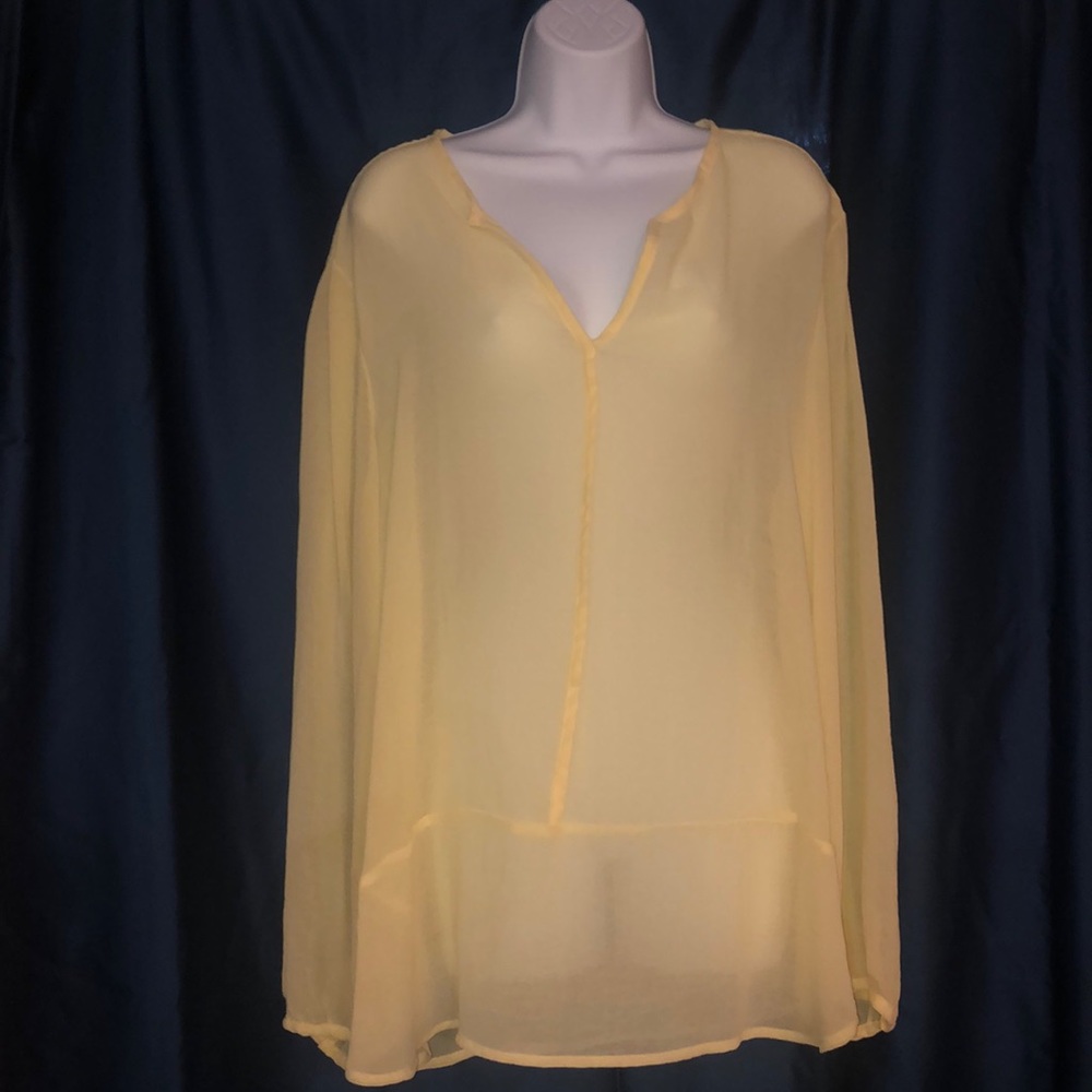 Sheer yellow New York and Company blouse.